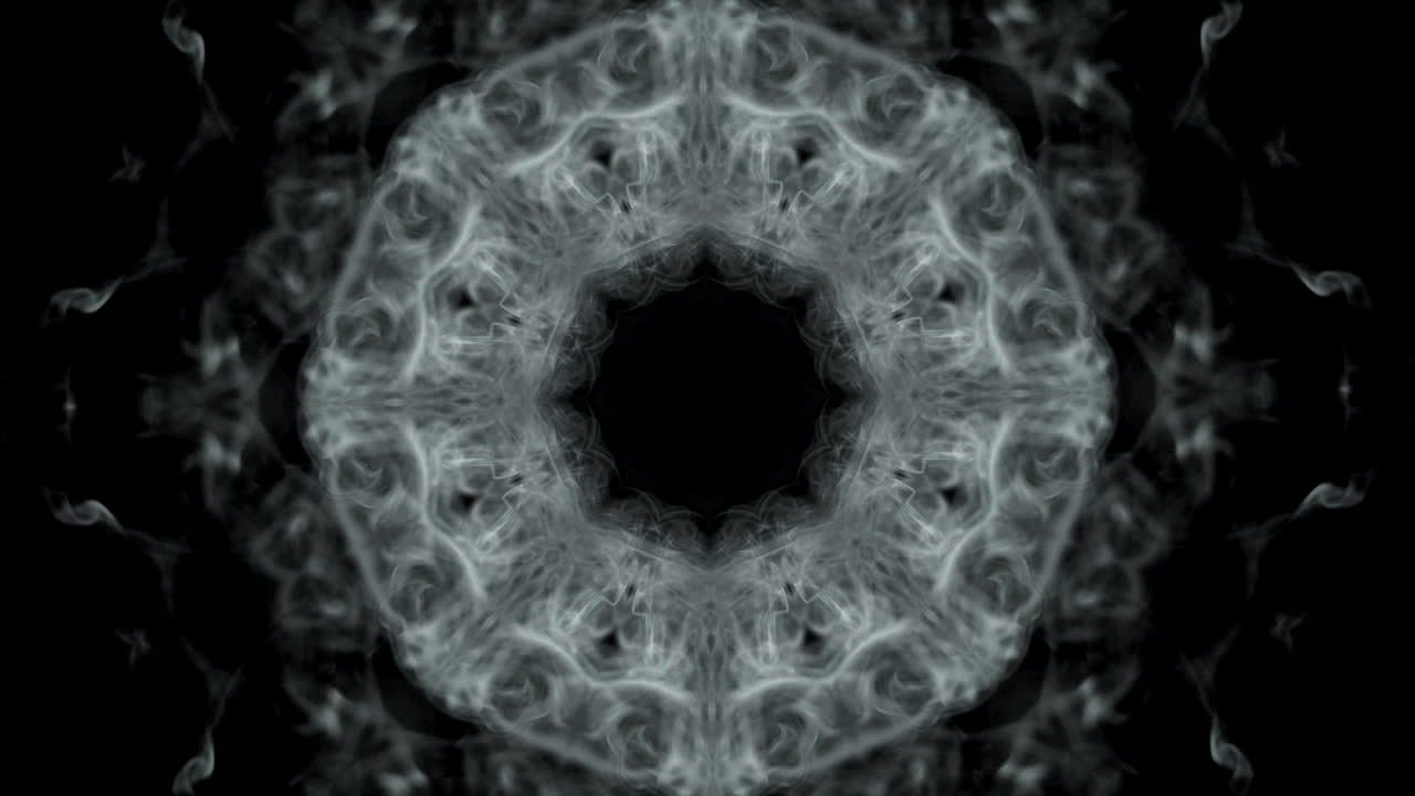 efecto de humo en el caleidoscopio negro de fondo