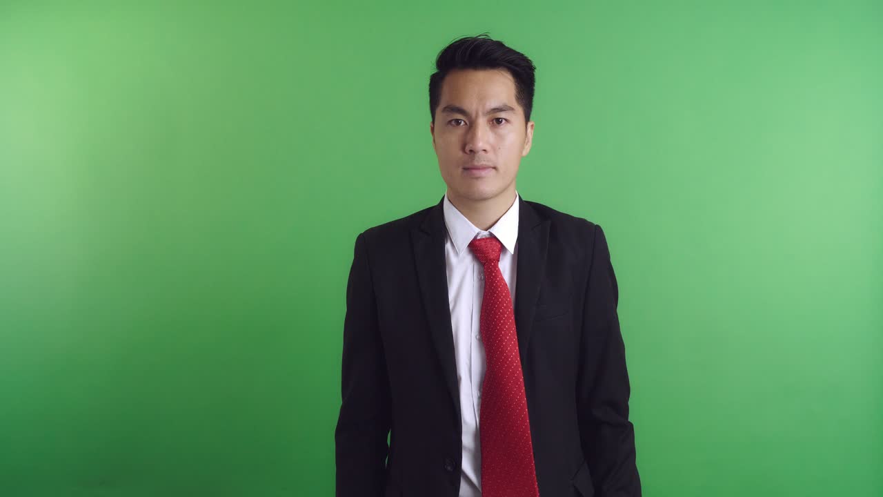 Businessman Portrait Against Green Screen