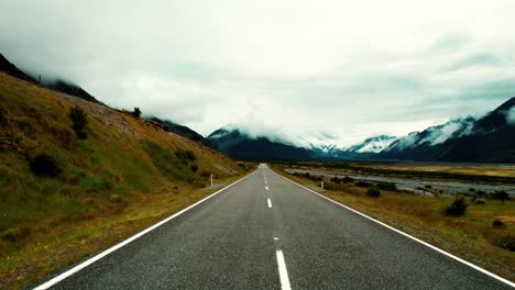 Mount-Cook-National-Park,-New-Zealand-Drone-Flys-Along-Valley-Road