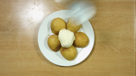 Top-Shot-Of-Fried-Ores-With-Ice-Cream-On-Top-And-A-Drizzle-Of-Chocolate-Sauce