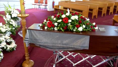 closeup-shot-of-a-funeral-casket-in-a-hearse-or-chapel-or-burial-at-cemetery