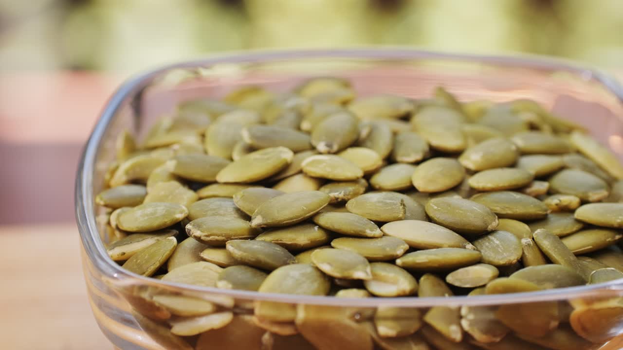 Pumpkin Seeds in a Glass Bowl