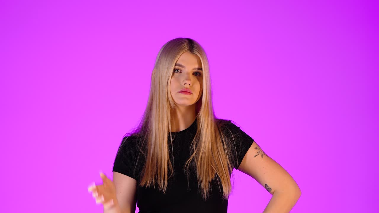 Confused Young Woman with Blonde Hair