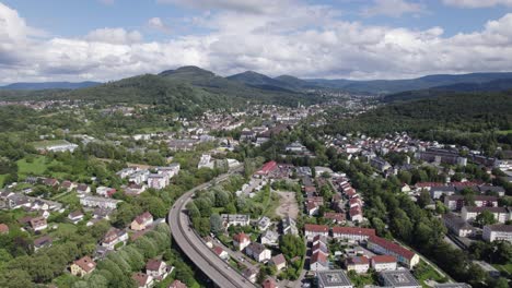 aerial view across baden baden waldseestraße alongside old spa town in germany towards black forest mountain range