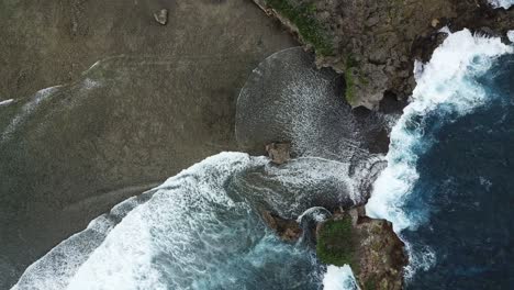 bird's eye slow shot over the rock island on siargao island