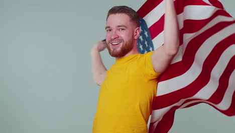 Man-waving,-wrapping-in-American-USA-flag,-celebrating,-human-rights,-freedoms,-Independence-Day