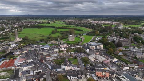 aerial view of a historic town in ireland with a castle
