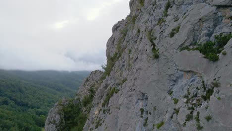 Drone-footage-of-a-climbing-cliff-in-the-Pyrenees-moutains-at-Tarascon-sur-Ariège