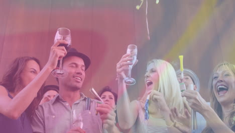 celebrating at lively party, people with drinks and smiles, enjoying animation