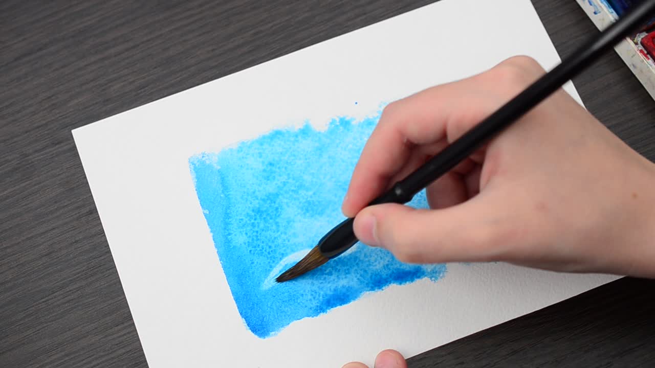 We draw the house. We draw water color paints