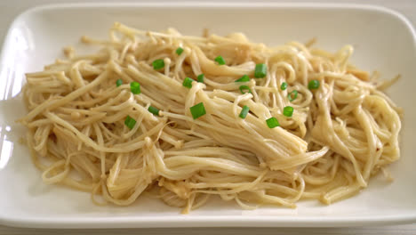 stir-fried golden needle mushroom with butter