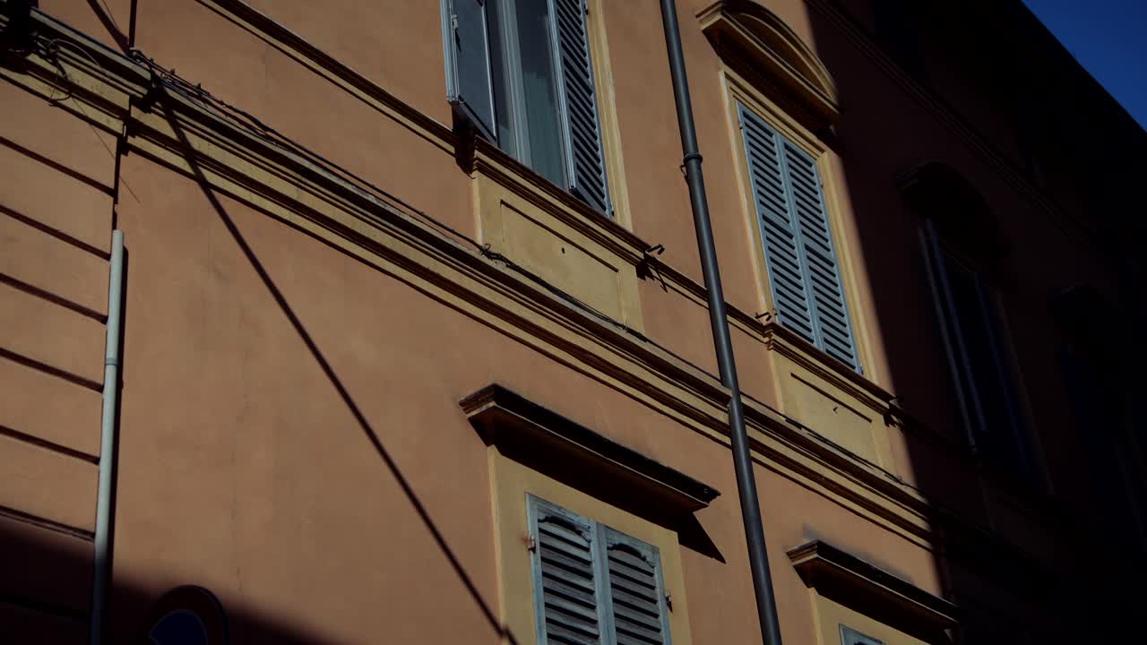 Italian Building Facade with Shutters