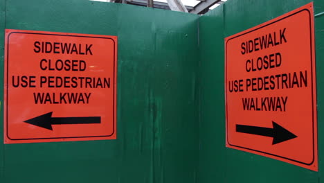 construction sign, closed sidewalk, use pedestrian walkway, gentrification