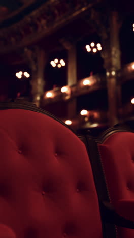 red velvet seats in an empty opera house