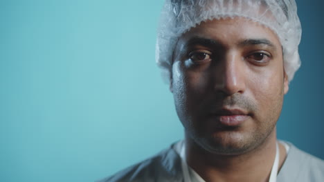 studio portrait of middle eastern male doctor