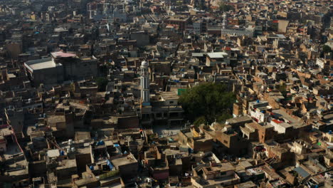 old compact city with mosque minaret in rawalpindi, pakistan