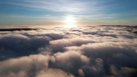 flying above the clouds towards the sunrise