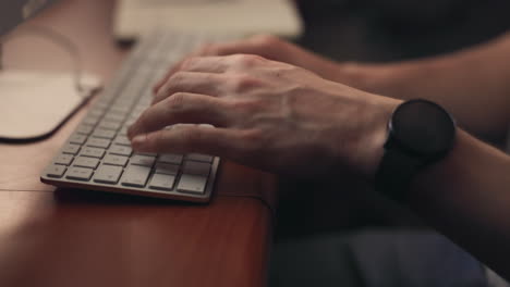 person typing on a keyboard