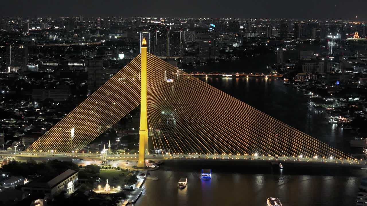 Drone view at night of Rama VIII Bridge in Bangkok, Thailand