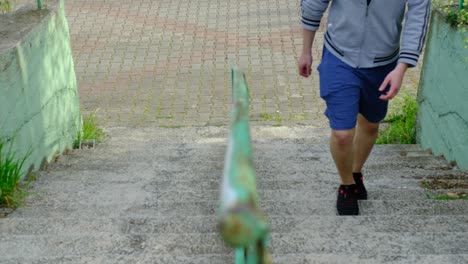 man climbing stairs