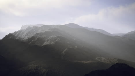 majestic mountain range shrouded in mist reveals stunning natural beauty