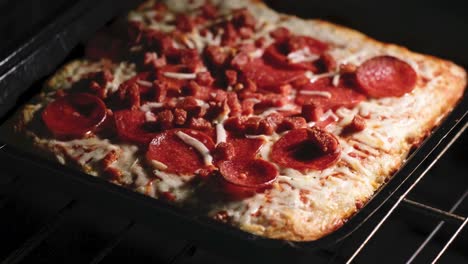 frozen pizza getting baked in the oven