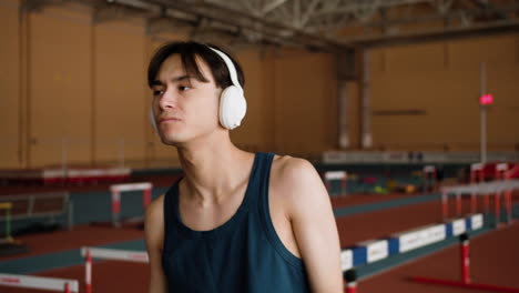 young man dancing indoors