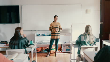 education, school and a woman teacher in a class