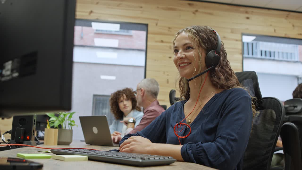 Business office with employees working