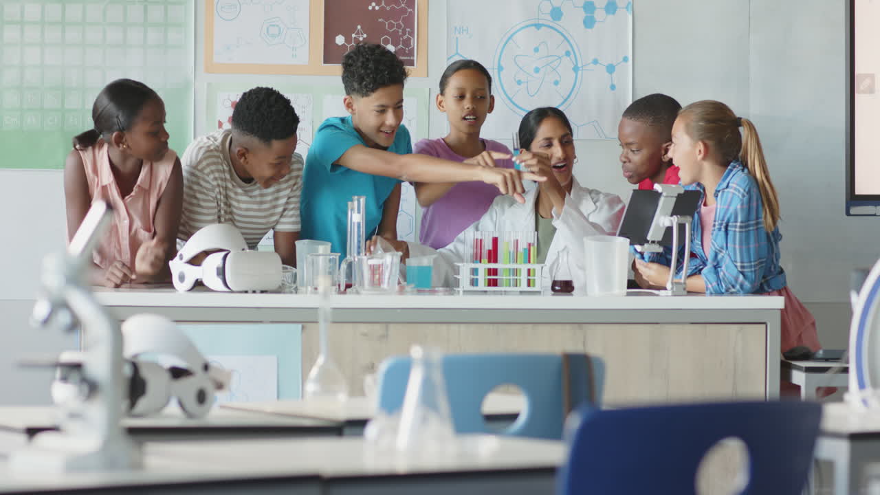 In school, diverse group of students collaborating on science project in classroom