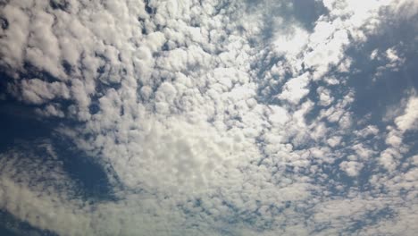 fluffy cloud sky above on a sunny, summer day, in los angeles, california - pan view