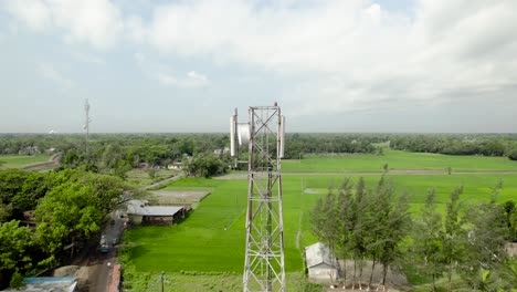 Aerial-view-of-a-cellphone-tower-in-a-village