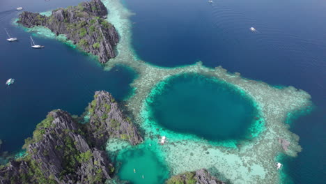 aerial footage of the famous twin lagoon of coron, palawan