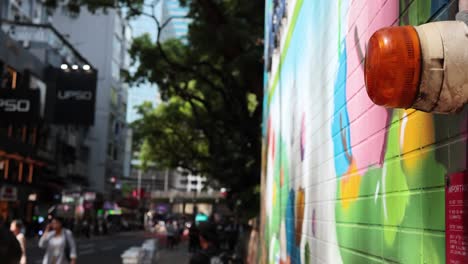 vibrant mural and bustling street activity