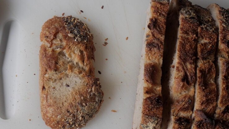 Crusty bread and olives create a rustic dining atmosphere
