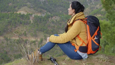 young woman enjoying a day in the wilderness