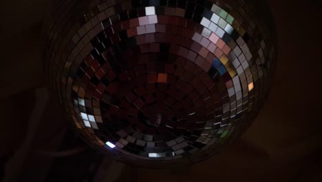 slow motion shot of mirror ball spinning, close up