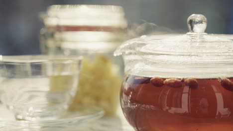 teapot with hot tea at outdoor