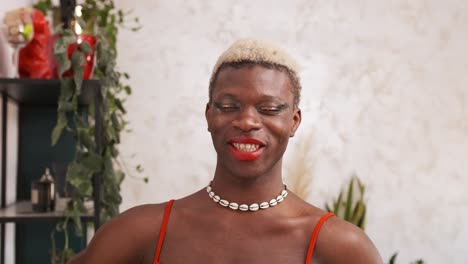 portrait of a smiling person with makeup