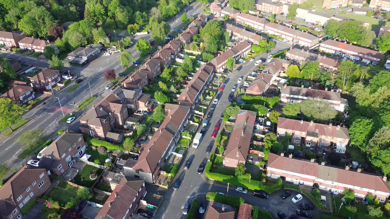 4K aerial shot of typical British houses from above in the morning and housing crisis
