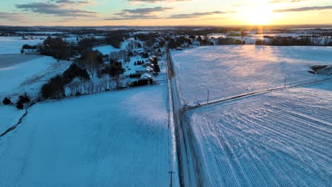 snow covered farm fields in winter in lancaster county pennsylvania