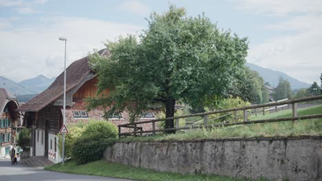 wimmis switzerland europe rural village elderly man walking