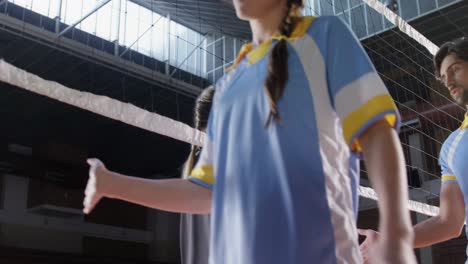 Volleyball-players-giving-high-five-to-each-other-4k