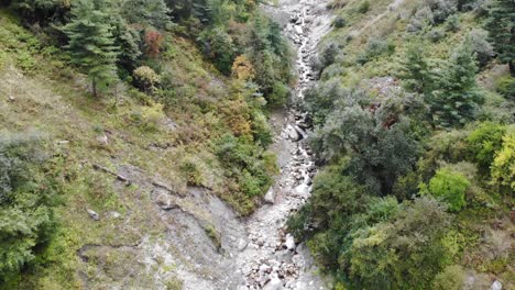 Tourists-Crossing-Over-The-Hanging-Bridge-At-The-Valley-Within-Annapurna-Circuit-In-Nepal