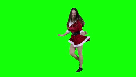 Feliz-Y-Emocionada-Adolescente-Vestida-De-Papá-Noel-Divirtiéndose-En-Las-Vacaciones.-Una-Joven-Baila-Frente-A-Una-Pantalla-Verde-Con-Canciones-De-Año-Nuevo-Celebrando-La-Navidad-Sola.