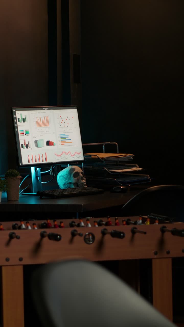 Office Setup with Computer and Foosball Table