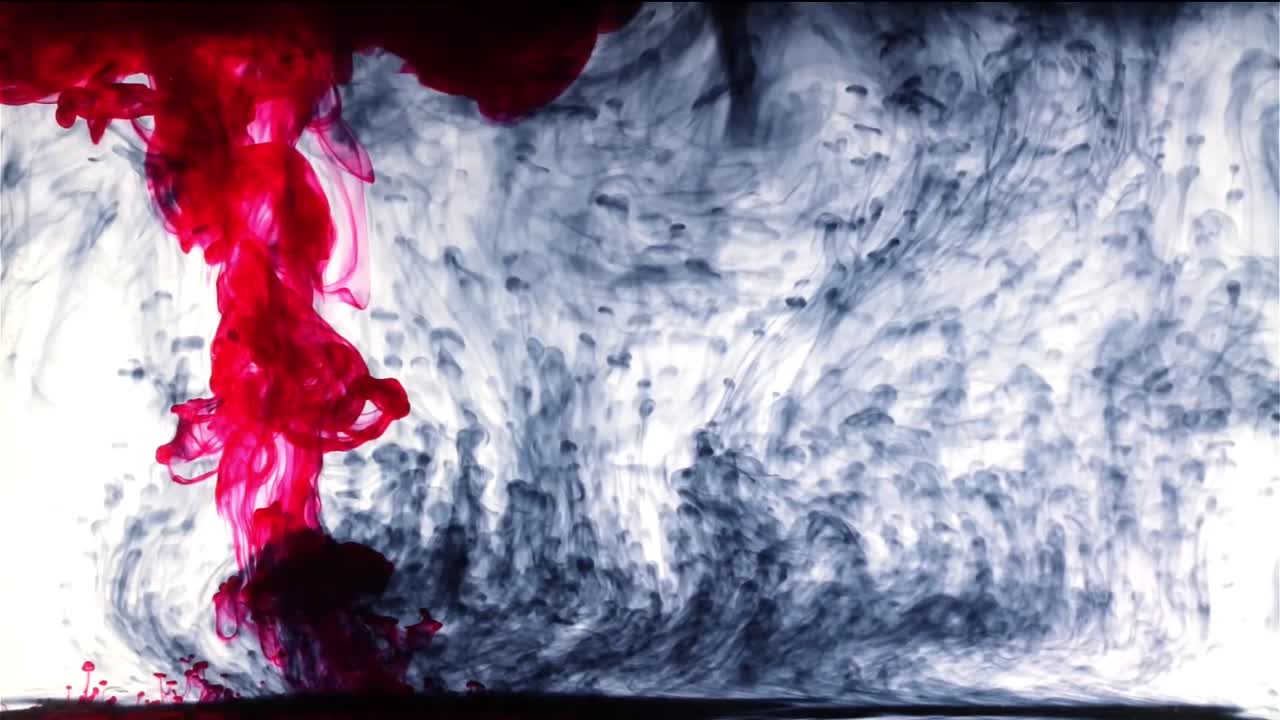 Ink Drops Background Stock Footage features mesmerizing liquid ink drops dispersing smoothly in a fluid environment, creating abstract and artistic motion visuals