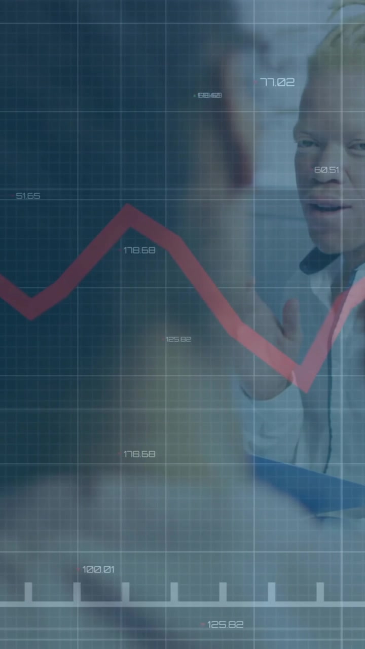 Financial graph animation over diverse business people working in office