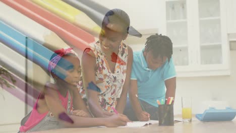 varios lápices de color contra una madre afroamericana ayudando a su hija con su tarea