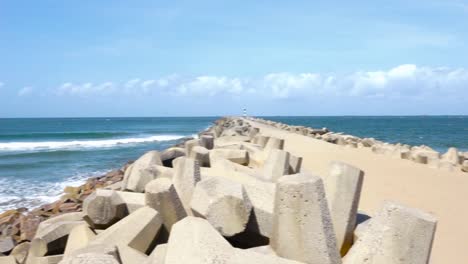 tiro panorámico de dolos pier en richards bay, sudáfrica
